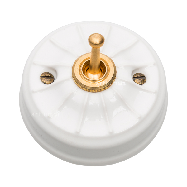 Interruptor latón porcelana grabada