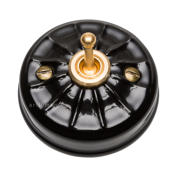 Interruptor latón porcelana grabada