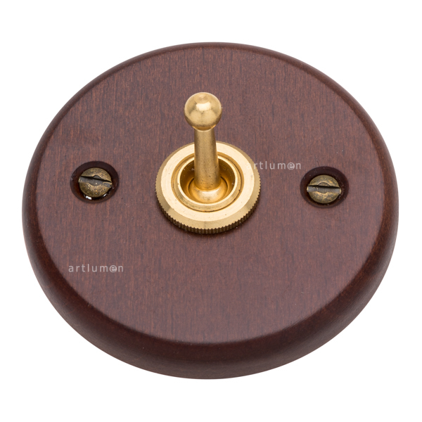 Interruptor madera oscura y latón