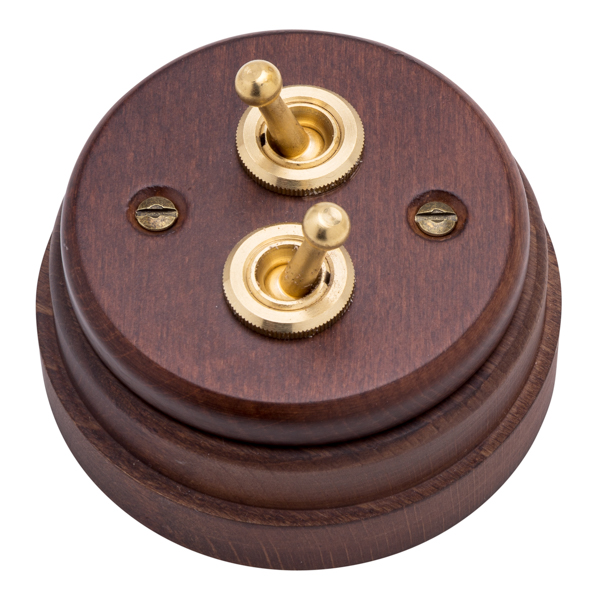 Interruptores madera oscura y latón