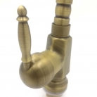 Grifo de cocina en bronce