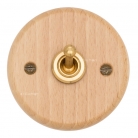 Interruptor madera clara y latón