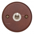 Interruptor madera oscura y níquel