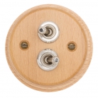 Interruptores madera clara y níquel