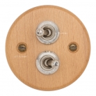 Interruptores madera clara y níquel