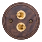 Interruptores madera nogal y latón