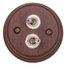 Interruptores madera oscura y níquel