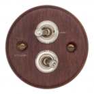 Interruptores madera oscura y níquel